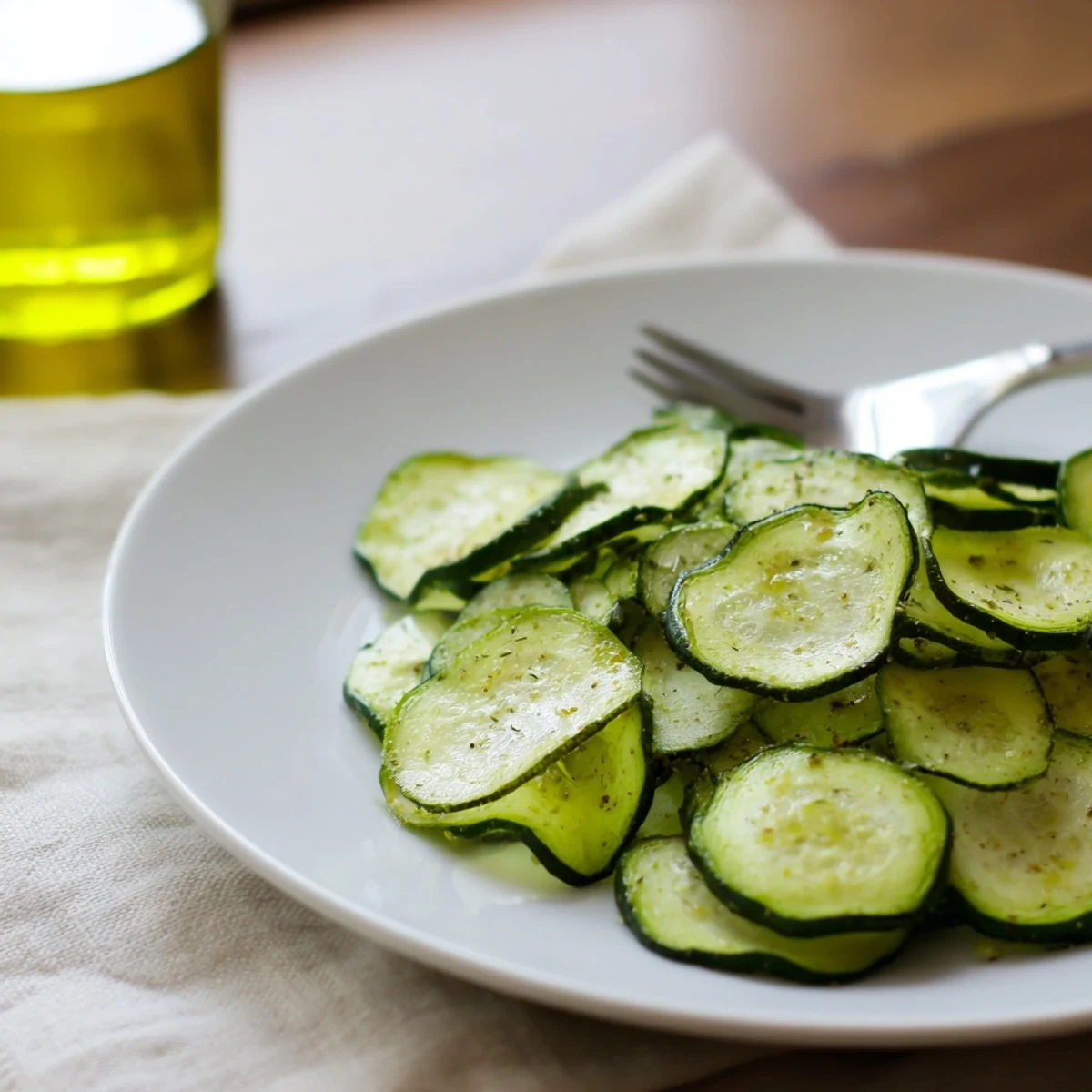 Crispy refreshing ranch cucumber chips with tangy ranch seasoning on thin cucumber slices.