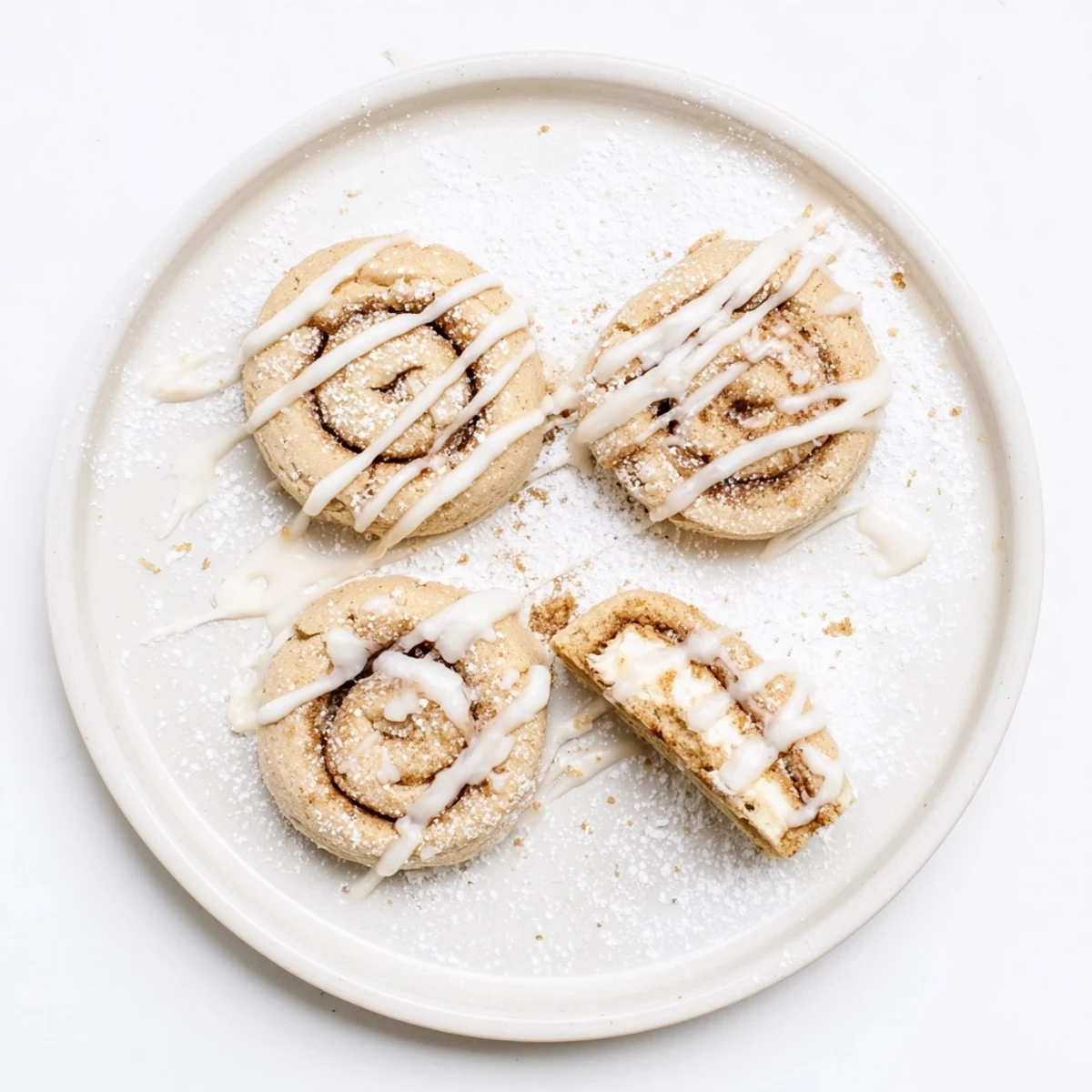 Cinnamon Roll Cheesecake Cookies warm from oven, gooey centers and cinnamon swirl