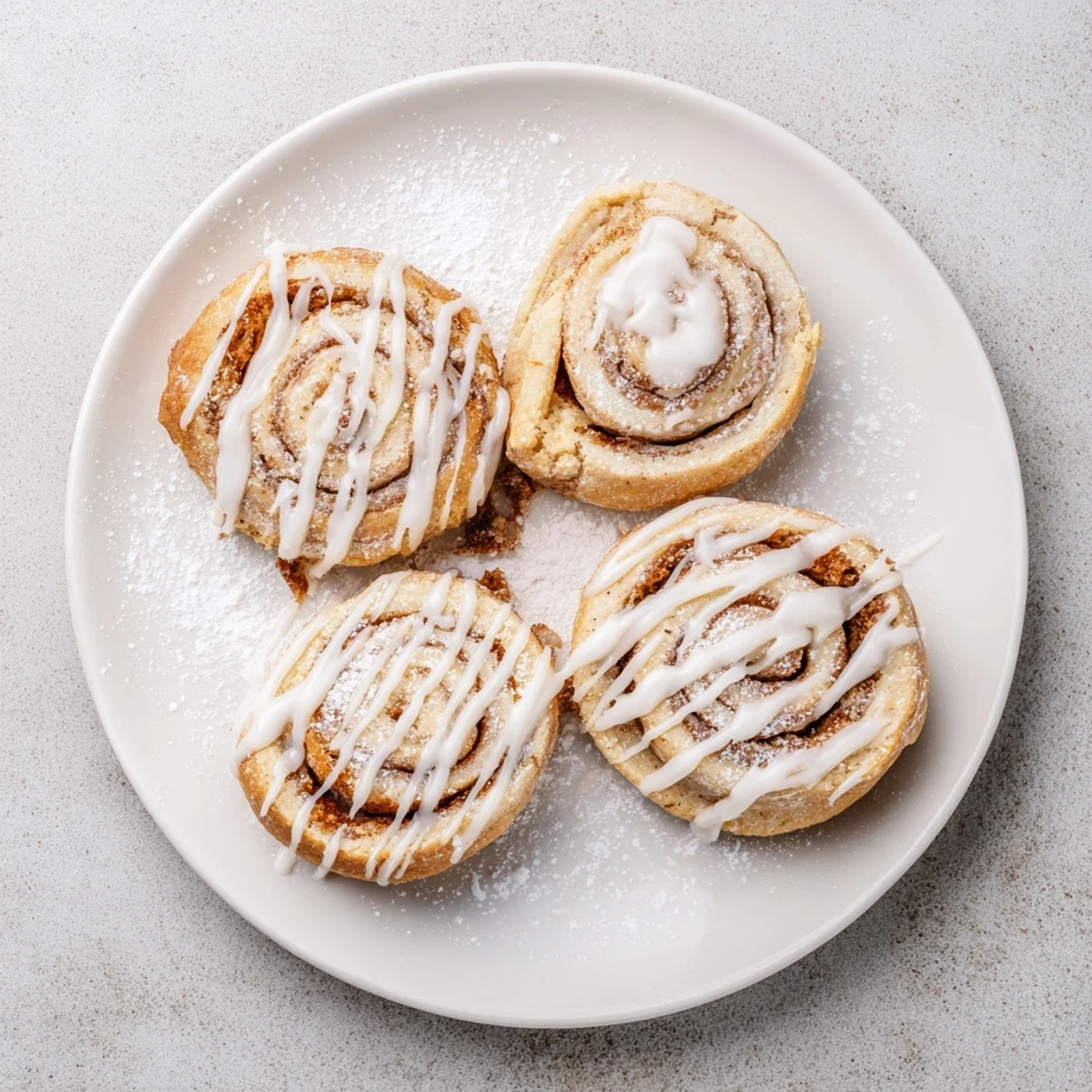Stacked Cinnamon Roll Cheesecake Cookies with cream cheese filling, cinnamon aroma