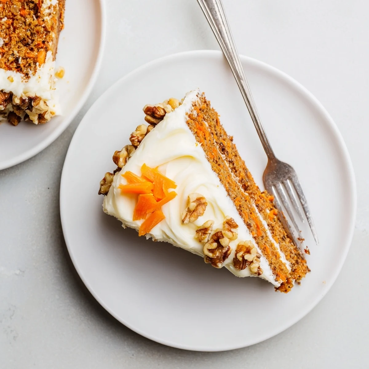 Moist Carrot Cake With Cream Cheese Frosting, tangy icing and walnut crunch.