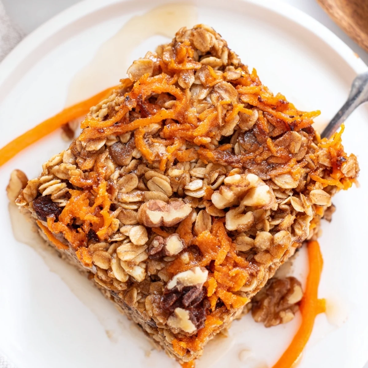 Golden Carrot Cake Baked Oatmeal steaming in dish, ready for yogurt  