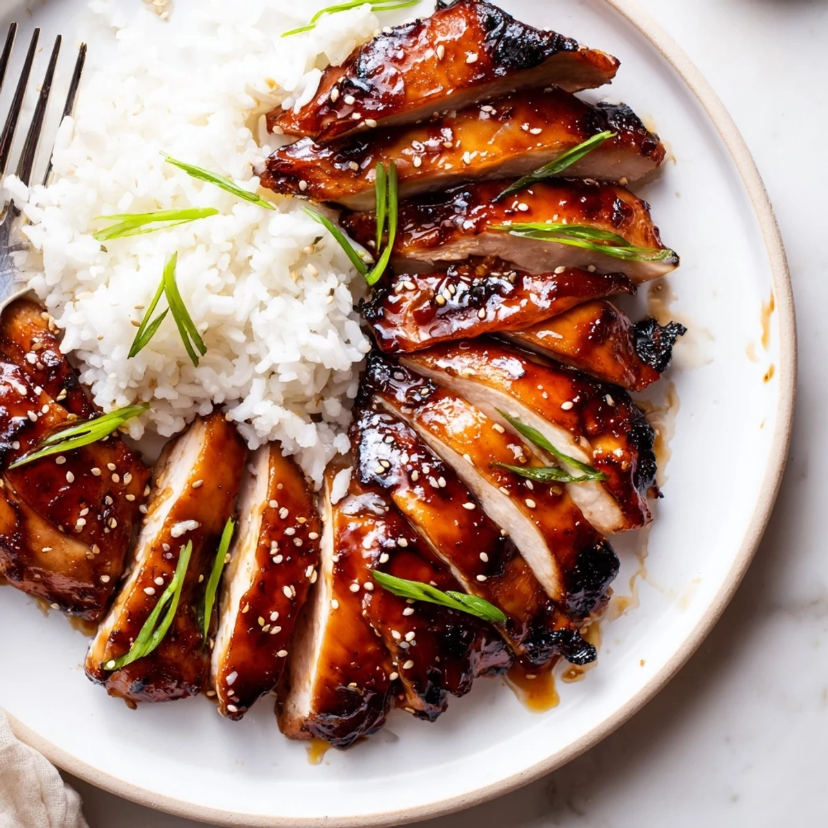 Oven-roasted Char Siu Chicken glazed sticky-sweet, served alongside crisp stir-fried greens