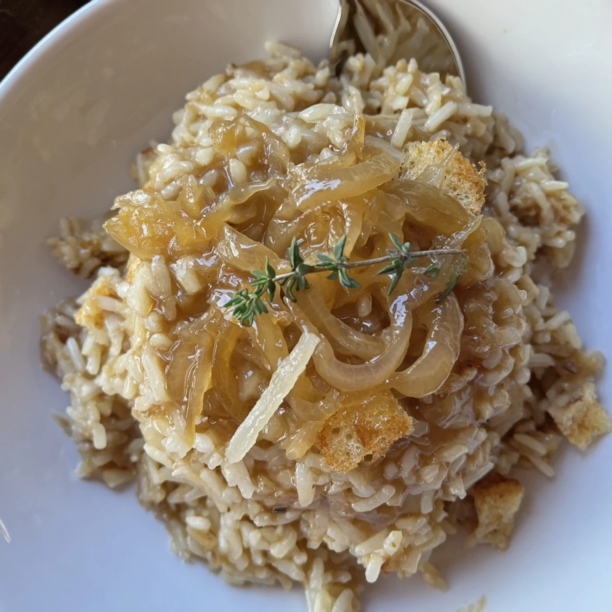 Warm French Onion Soup Rice served straight from oven, savory broth aroma