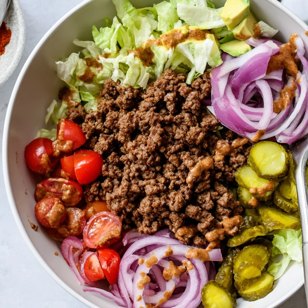 Savory Protein Packed Burger Bowls with warm seasoned beef, crisp romaine lettuce.