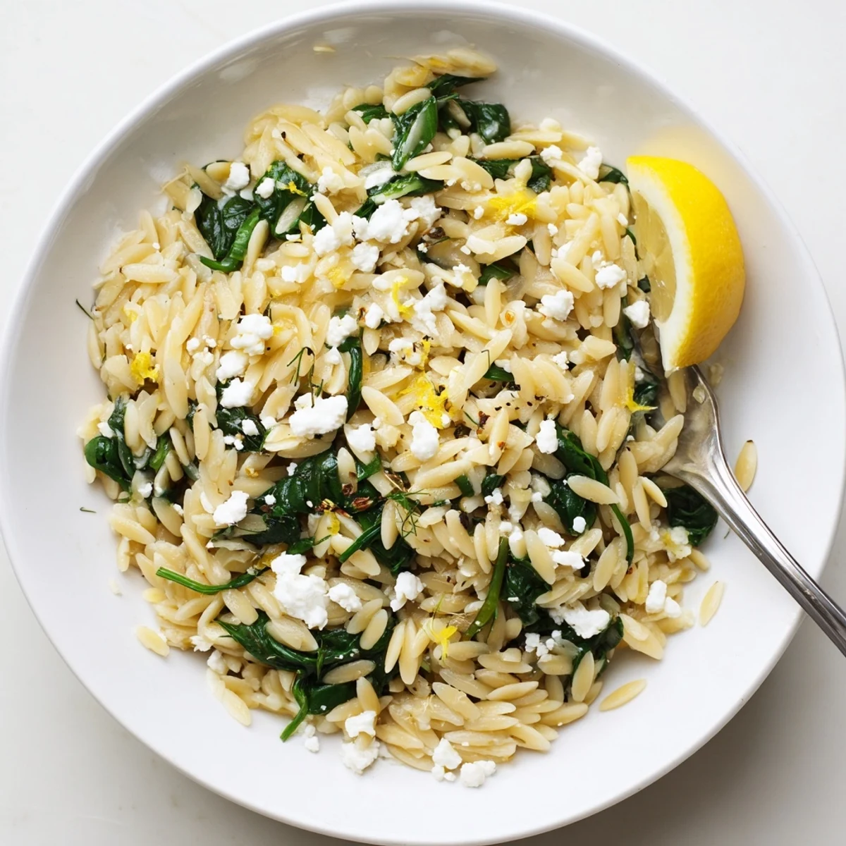 One Pan Lemon Orzo With Spinach Feta steaming, bright lemon aroma, sprinkled dill