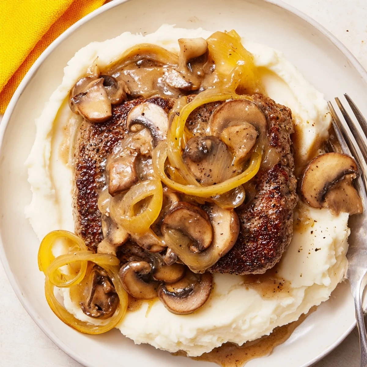 Serve Country Style Smothered Cube Steak Recipe hot with buttered egg noodles