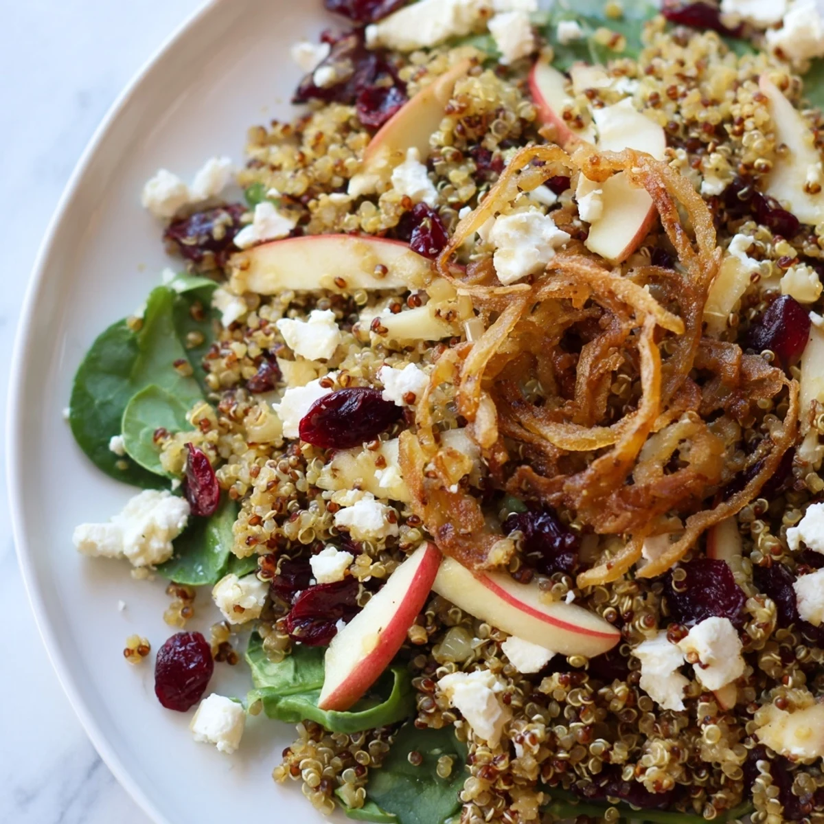 Crispy shallots top this bright Honey Mustard Quinoa Apple Salad with diced sweet apples