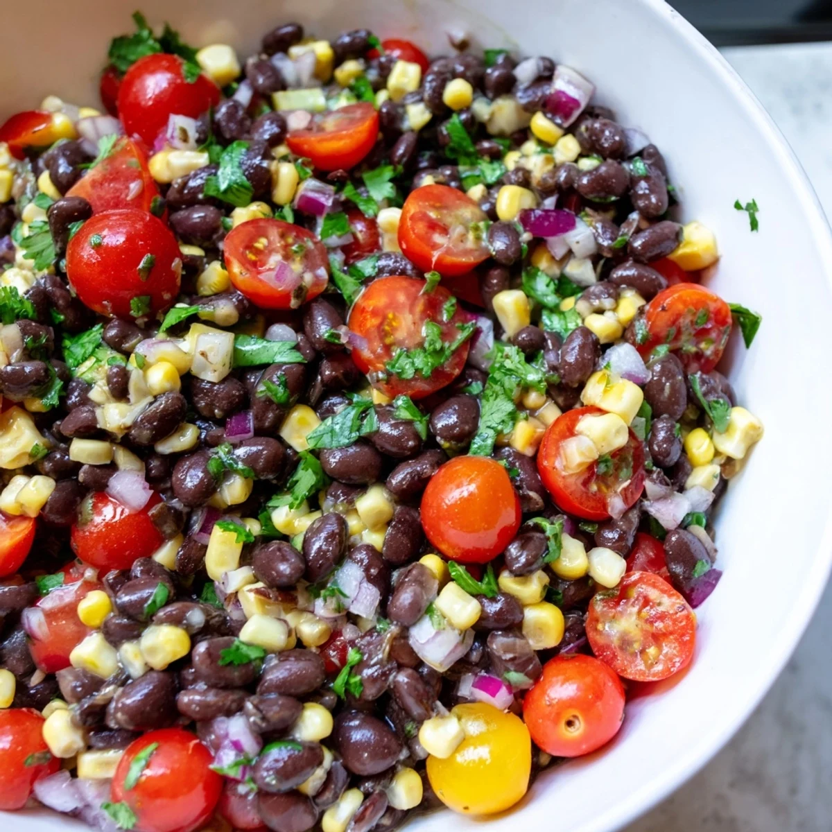 Vibrant Cowboy Caviar bursting with black beans corn and zesty lime dressing