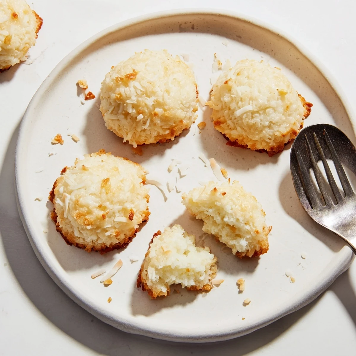 Soft and buttery coconut cookies studded with shredded coconut, fresh from the oven